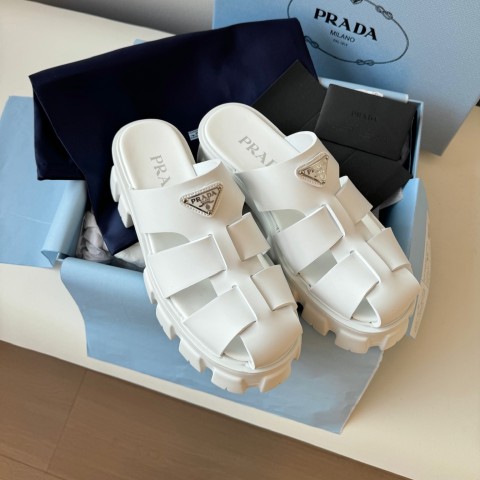 프라다 삼각로고 모노리스 케이지드 뮬 슬리퍼 굽5.5cm 블랙 화이트